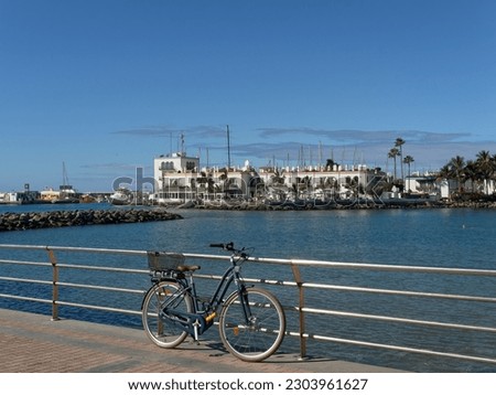 Seascape with bicycle in the foreground in Canary Islands