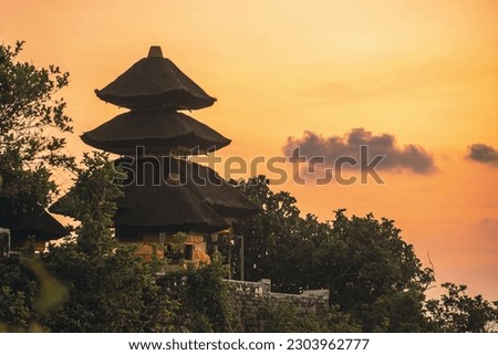 Uluwatu Temple at sunset. Bali. Indonesia. High quality photo Royalty-Free Stock Photo #2303962777