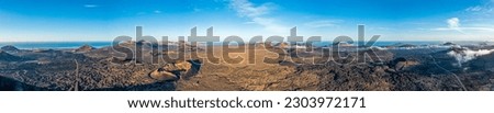 Panoramic drone picture over the barren volcanic Timanfaya National Park on Lanzarote at sunrise