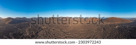 Panoramic drone picture over the barren volcanic Timanfaya National Park on Lanzarote during daytime