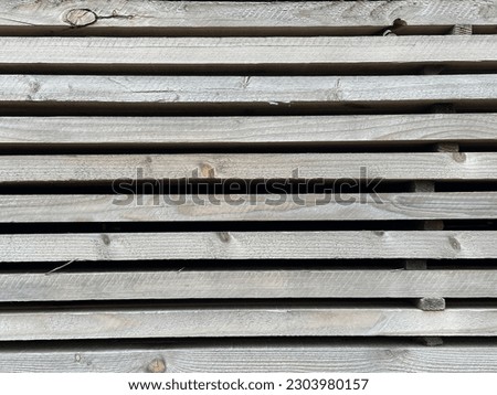 Wooden planks of wood stacked up to dry