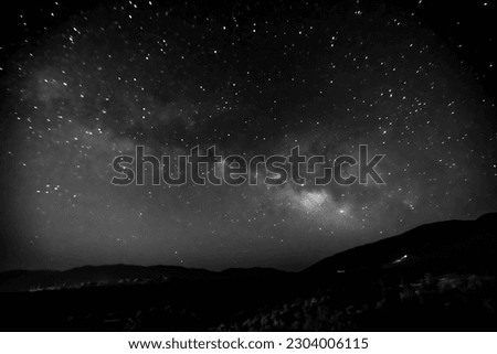 The milky way galaxy above the sky of Azilal in black and white