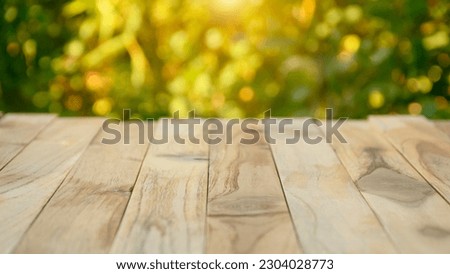 Wooden board on table with shadows, display podium for product mockups 3d trade show display advertising, Natural blurred defocused background 