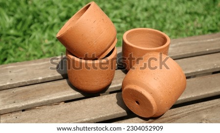 Clay pots for plant, Terra Cotta pots for planting, terracotta pots 0n the wood floor in the garden Royalty-Free Stock Photo #2304052909