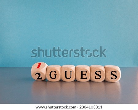 Turned a dice and changes the expression "2nd guess" to "1st guess", or vice versa. Beautiful gray table blue background. Business and from 2nd guess to 1st guess. Copy space. Royalty-Free Stock Photo #2304103811