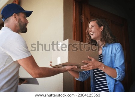 Happy woman, delivery man and package box at door for order, parcel or cargo of customer in transport service. Female person receiving shipment from male courier, supply chain or deliver at the house Royalty-Free Stock Photo #2304125563