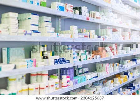 Pharmacy, shelf and boxes for product, empty or pharmaceutical stock for wellness, health and interior. Shop, store and retail healthcare with storage, choice or sale for wellness, discount and drugs Royalty-Free Stock Photo #2304125637