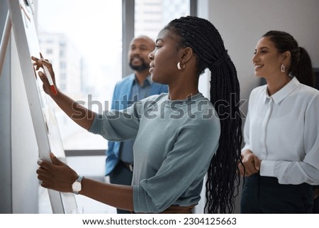 Black woman, business writing and office whiteboard for company planning with strategy. African female employee, meeting and sales collaboration of staff working with teamwork and workshop idea Royalty-Free Stock Photo #2304125663