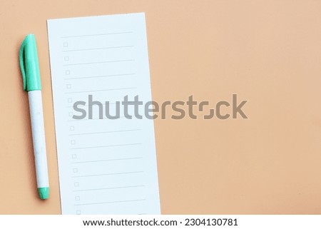 To do list paper with notebook and pen with copy space