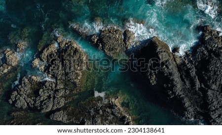 Beach with natural breakwater form by rocks, located at La Playita Resort, Pedasí, Panamá