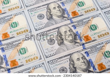 Closeup American dollars banknotes background. US dollars pattern. 100 dollars, Mr. Franklin
