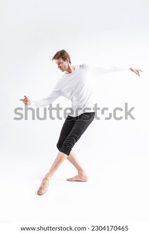 Young, handsome, sporty and athletic ballet dance.Vertical Image