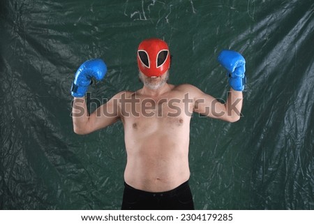 mexican wrestler in red mask