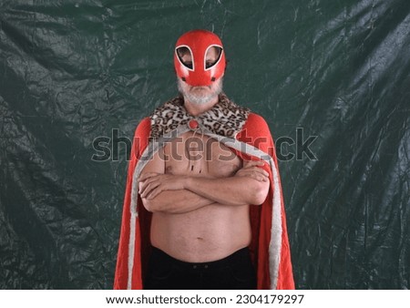 mexican wrestler in red mask