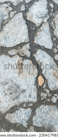 The texture of the old cement road floor, taken from a close distance
