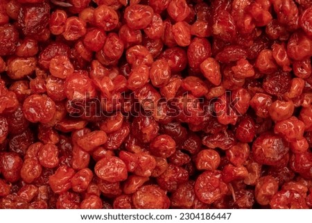 Close-up red dried cherry, full frame. view from above  Royalty-Free Stock Photo #2304186447