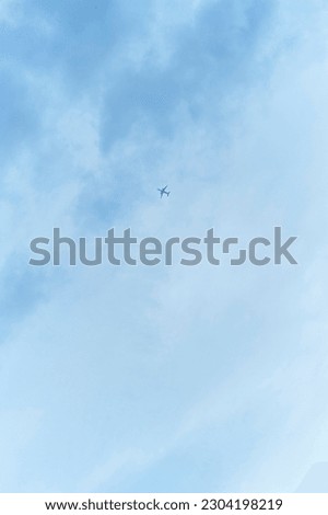 A air plane fly high in blue sky