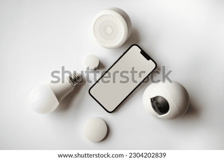 Smart home devices. Home automation tools. Smart phone mockup clean screen. Royalty-Free Stock Photo #2304202839