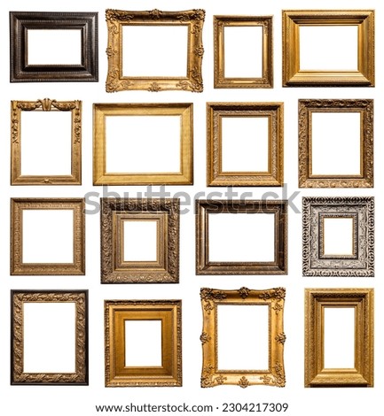 set of very wide old wooden picture frames isolated on white background with cut out canvas