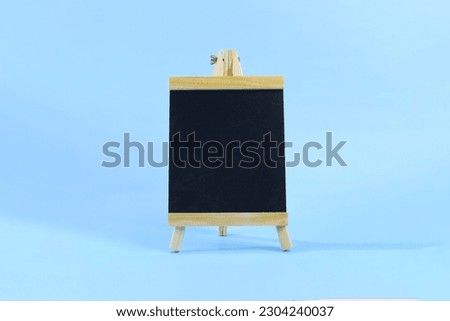 chalkboard on blue background ready to insert promotional text