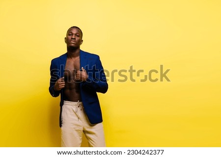 African American millennial businessman isolated on studio background, successful male formal suit