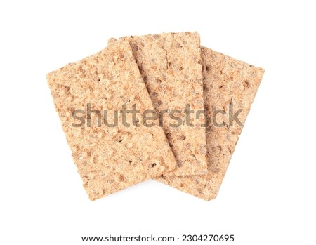 Fresh crunchy crispbreads on white background, top view Royalty-Free Stock Photo #2304270695