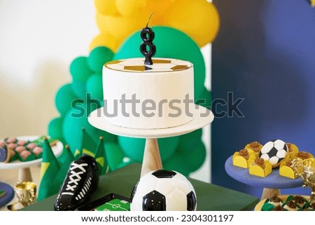 football themed table decorated boy party