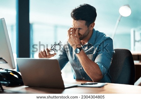 Eye strain, headache and business man at laptop with stress, mental health problem and brain fog. Tired, frustrated and confused worker at computer with fatigue, burnout and pain of vertigo in office Royalty-Free Stock Photo #2304304805