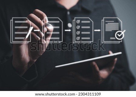 Businessman using e document on digital tablet, virtual notepad on virtual screen. E-signing, electronic signature, document management, paperless office. Online contract signing with application.