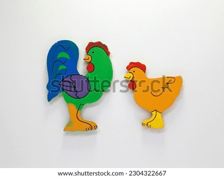 Figures for children of farm animals. Chicken, rooster. Couple. Educational images for toddlers and babies. Colorful drawings on white background.