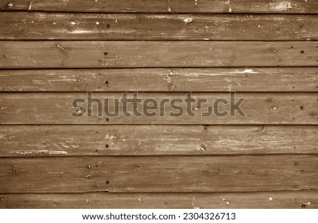 Wooden log house wall texture in brown tone. Abstract architectural background and texture for design.