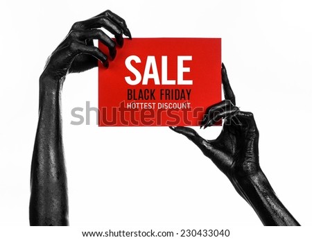 Black Friday theme: black hand holding a red card for a discount on white background