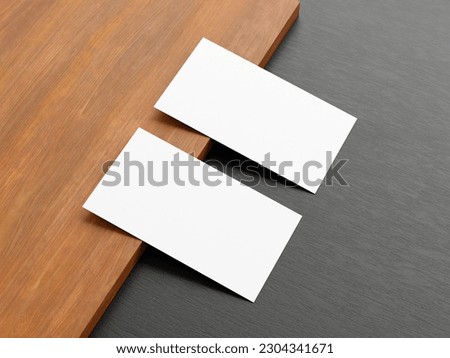Business card mockup on wood table