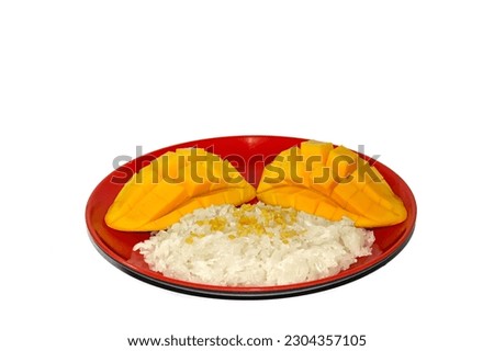 Mango with sticky rice put on white background in dish red color,the delicious dessert of Thailand.concept picture isolation object.
