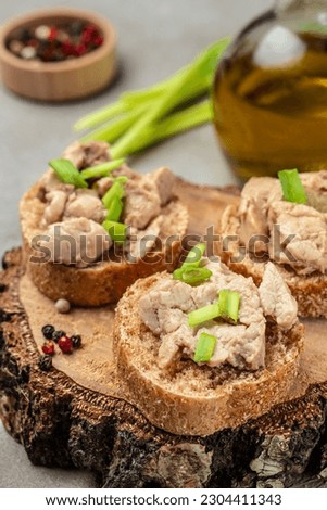 Sandwich with cod liver on rye bread. Healthy food concept. Food recipe background. Close up.