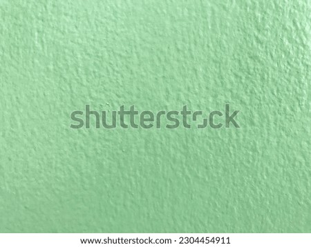 Light green wallpaper also enhances the look and feel of hardwood floors