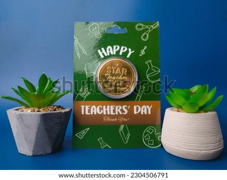 Happy teacher day gift with green plant on a blue background