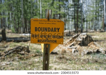 Fort Apache Indian Reservation Boundary Sign: Native American Public Land - US Department of the Interior, Bureau of Indian Affairs Royalty-Free Stock Photo #2304515573