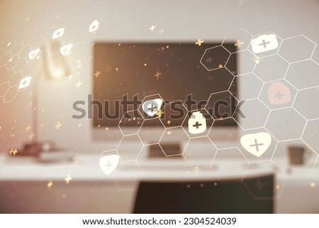 Double exposure of creative abstract medical hologram on laptop background. Healthcare technolody concept