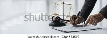 copy space, banner, panorama Lawyer or legal advisor reading and reviewing contract documents for fairness and legality before signing in office legal concept.