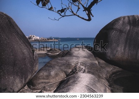 A cluster of giant granite stones on Tanjung Tinggi Belitung Beach