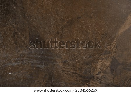 Dark background of a plastered wall in vintage style for graphic design or wallpaper. The pattern of the concrete wall is designed in retro style. High quality photo