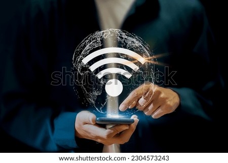 Use business smartphone with wifi icon, business communication social network concept.	 Royalty-Free Stock Photo #2304573243
