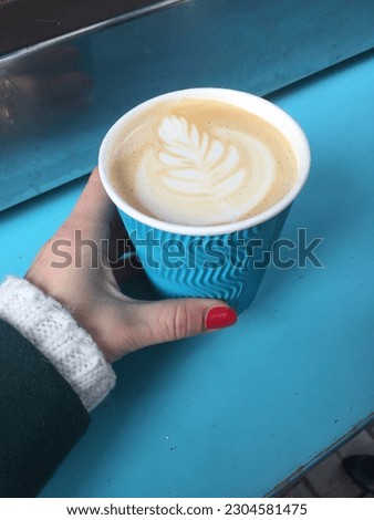 Cappuccino is a drink of Italian origin based on espresso with the addition of steamed milk, with a harmonious balance of the rich sweet taste of milk and espresso. with a picture of a swan in a cup