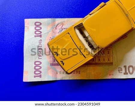 Yellow taxi car with money. taxi car