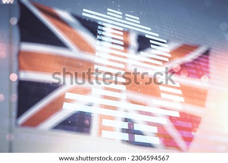 Double exposure of creative Bitcoin symbol hologram on flag of Great Britain and blue sky background. Mining and blockchain concept