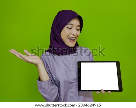 A Lady in Purple outfit standing over green background with an expression 