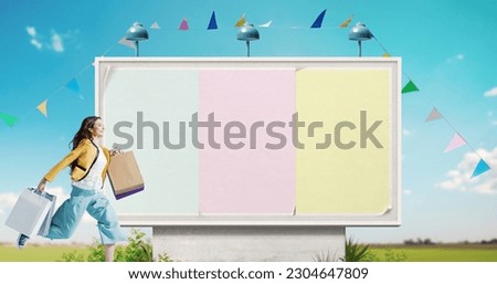 Large billboard with copy space and happy woman holding shopping bags, sale and offers concept