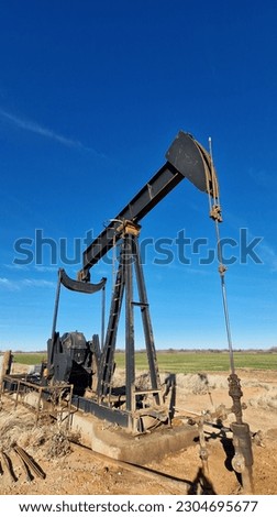 Oil pump jack working, Texas, USA