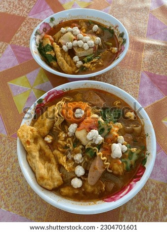 Picture of sundanese special spicy curry soup woth extra topping